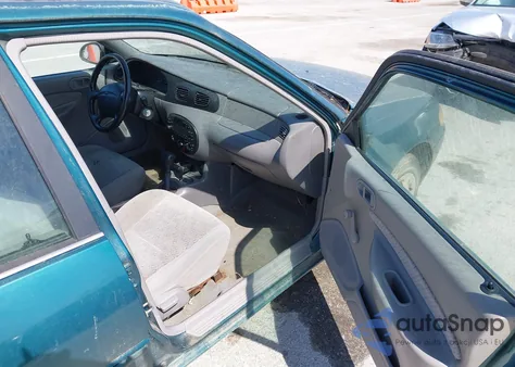 1997 Ford Escort Lx from USA, damaged, VIN 3FALP15P5VR153698